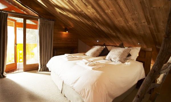 Bedroom with balcony under the eaves