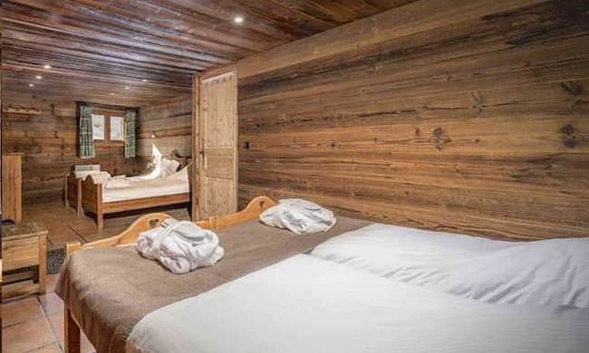 Family bedroom in Chalet Lou Trave Meribel