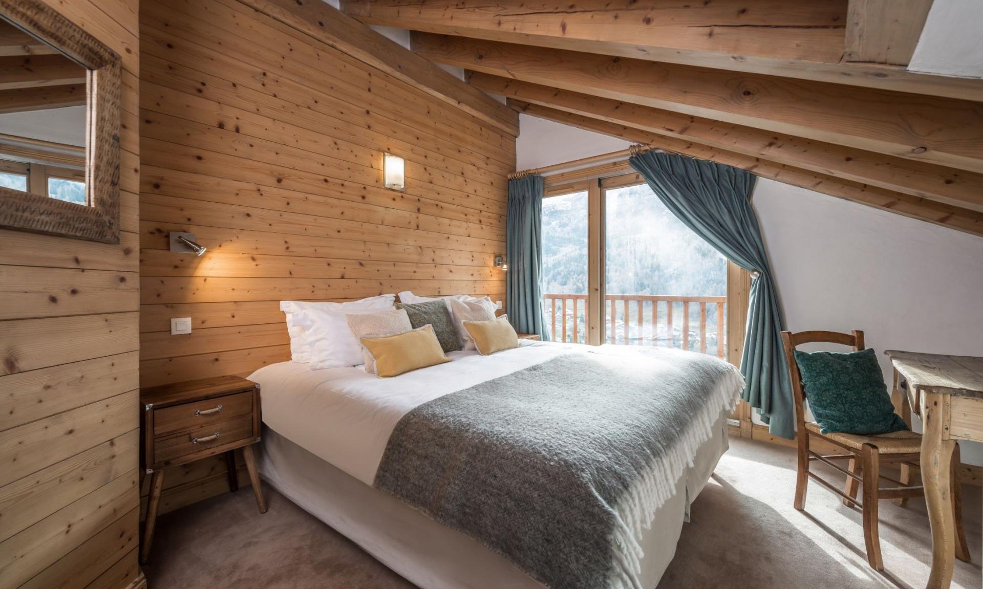 A spacious bedroom in Chalet Iamato Meribel Village