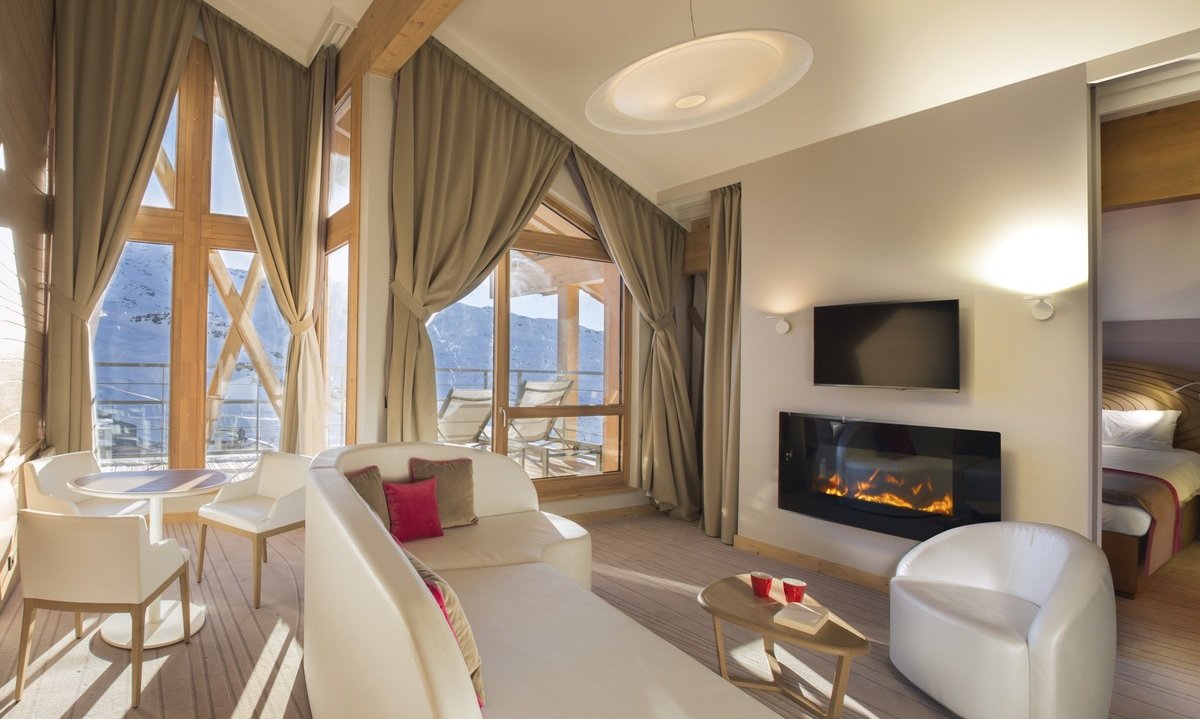 A Suite with lounge area at Club Med Sensations in Val Thorens