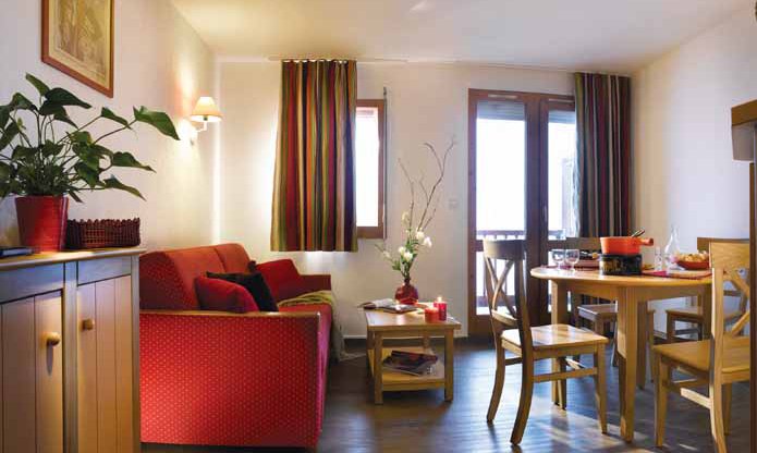 The living and dining area in the Ravines apartments Meribel
