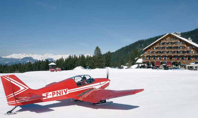 Plane at altiport meribel