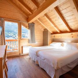 A Bedroom in Chalet L'Ancolie Meribel