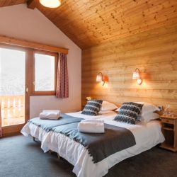 A Bedroom in Chalet Coivie in Meribel Les Allues