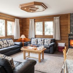 The Living room with stove in Chalet Covie Meribel Les Allues