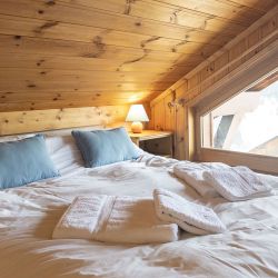 The Double Bedroom under eaves in Apartment Jardin in Meribel Morel