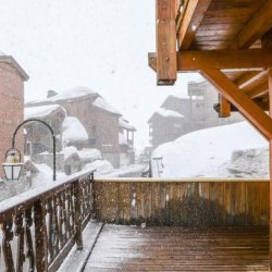 Chalet Aries balcony in the snow