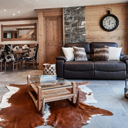 Living room with Stove in Chalet Chamois in Meribel