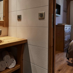 Bathroom and Bedroom in Chalet Chamois in Meribel