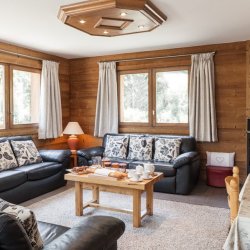 The Living room with stove in Chalet Covie Meribel Les Allues