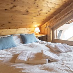 The Double Bedroom under eaves in Apartment Jardin in Meribel Morel