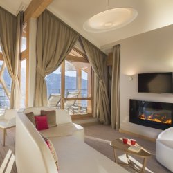 A Suite with lounge area at Club Med Sensations in Val Thorens