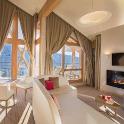 A Suite with lounge area at Club Med Sensations in Val Thorens