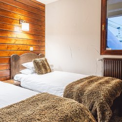 A Twin bedroom in Chalet Verseau Val Thorens