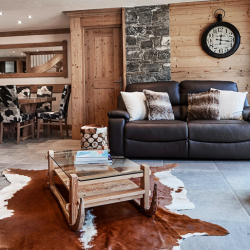 Living room with Stove in Chalet Chamois in Meribel