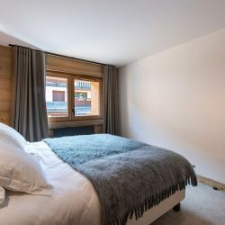 One of the bedrooms in Apartment Le Glaciers 12 Meribel