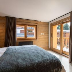 A bedroom in Apartment Le Glaciers 12 Meribel
