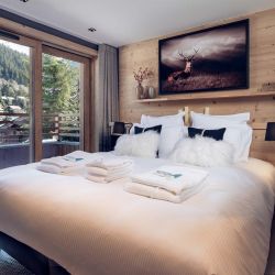 A bedroom in Chalet Harmony Meribel