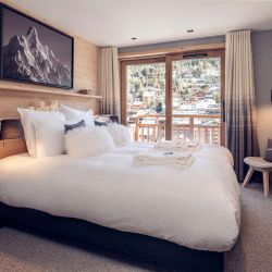 One of the bedrooms in Chalet Harmony Meribel
