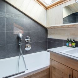 One of the bathrooms in Chalet Le Cedre Blanc Meribel