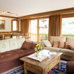 The Living room and dining area in Chalet Serpolet Meribel