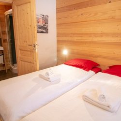 One of the bedrooms in Chalet Croquette Meribel