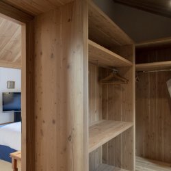 A Bedroom with walk in wardrobe in Chalet Foret, Meribel