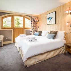 One of the spacious Bedrooms in Chalet Bellacima Lodge, Meribel