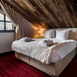 A bedroom in Chalet Tomkins Meribel