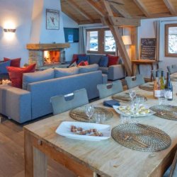 The large living and dining area in Chalet Rikiki Courchevel Moriond
