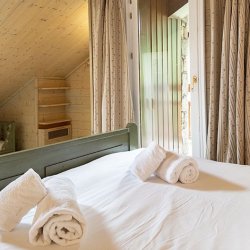 One of the double bedrooms in Apartment Dou du Pont in Meribel Centre