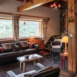 The comfortable Lounge area in Chalet La Fugue Meribel
