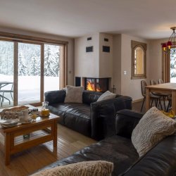 The spacious and comfortable living and dining area in Chalet L'Eterlou Courchevel