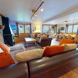 The Living area and dining area in Chalet Daurel, Meribel Centre