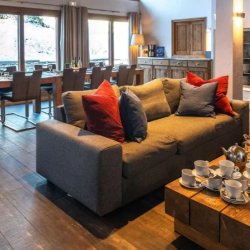 The large living and dining area in Chalet Rikiki Courchevel Moriond