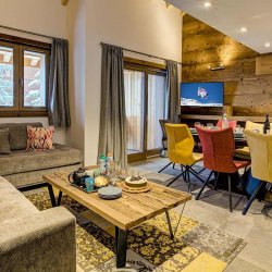 The Living and dining area in Chalet Germaine Meribel Mottaret