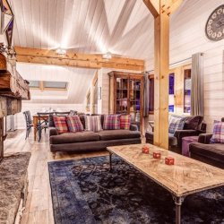 The spacious living room with fireplace, Chalet Pasarale, Meribel