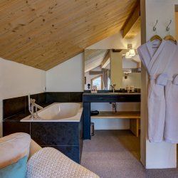 The bathroom in the Master bedroom in Chalet La Chouette Meribel