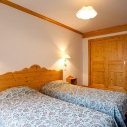 A Twin bedroom in Chalet Azalee Meribel