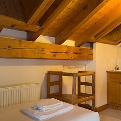A twin bedrooms in Chalet Blanche Neige in Meribel Centre