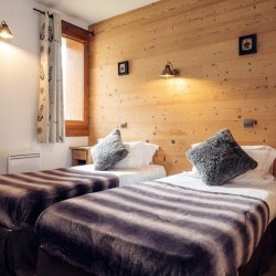 A Twin bedroom in Chalet Chloe Val Thorens