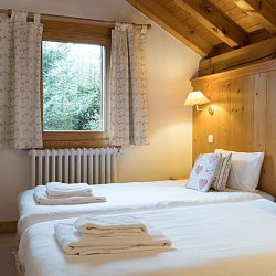 A bedroom in Chalet Blanche Neige in Meribel Centre