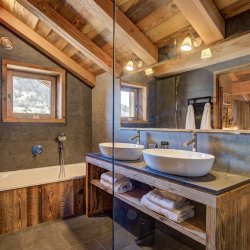 A luxury bathroom in Chalet Bergeronnette Meribel Nantgerel