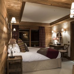 One of the comfortable bedrooms in Chalet Lapin Blanc Meribel