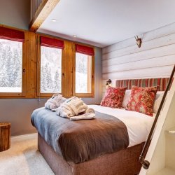 One of the double bedrooms in Chalet Quatre Meules Meribel