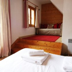 A Bedroom with extra bed in Chalet Snowbel,Meribel