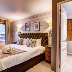 One of the double bedrooms in Chalet Pasarale Meribel