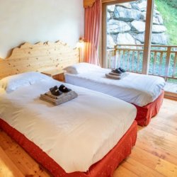 One of the bedrooms in Chalet Mira Belum Meribel