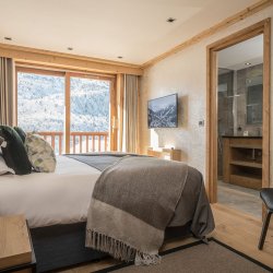 One the luxury bedrooms in Chalet Serendipity Meribel Village