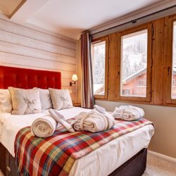 A double bedroom, Chalet Pasarale, Meribel